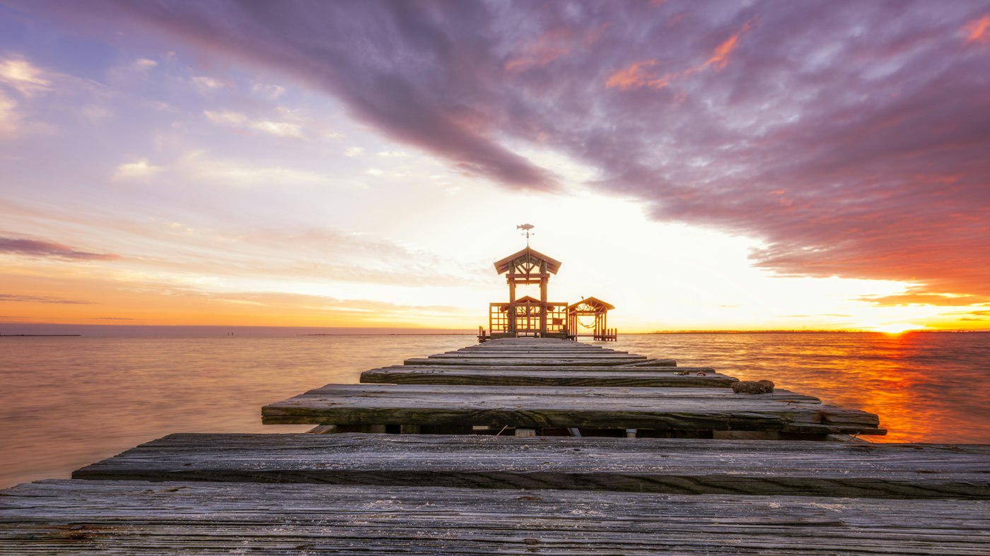 Sunset over the dock in Ocean Springs, Mississippi